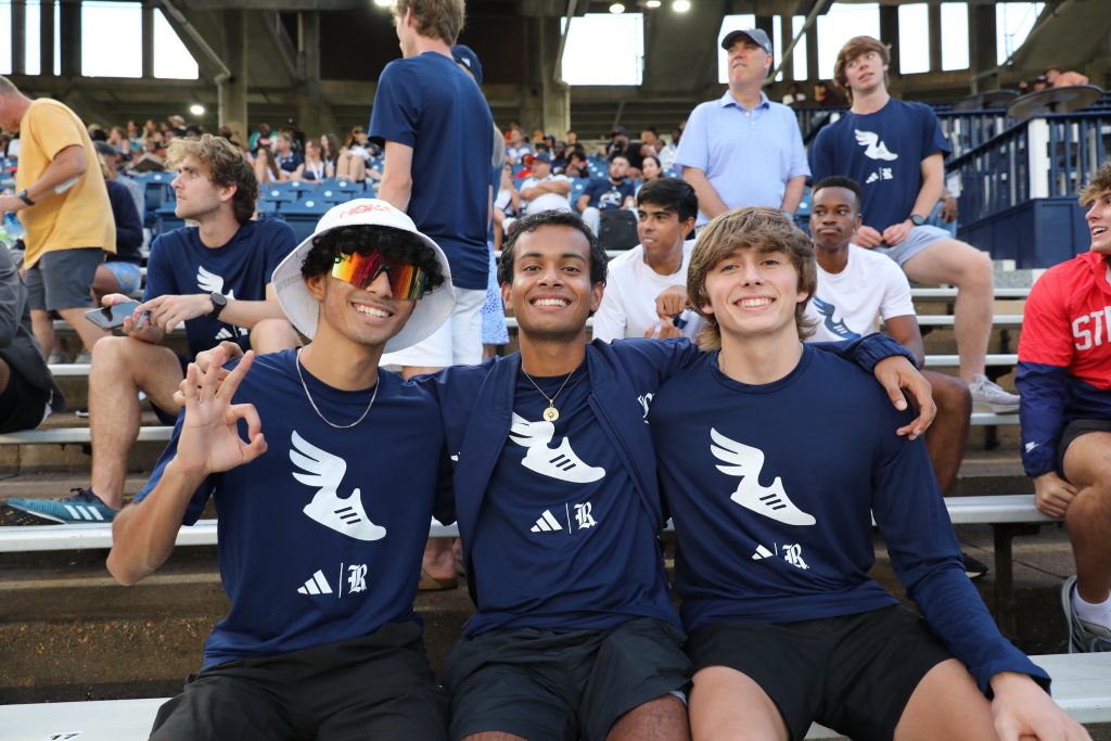 Fans posing at a stadium event, Flashbar roaming photography