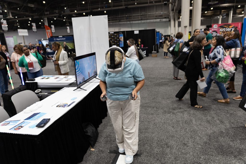 Attendee wearing a VR headset at a Flashbar VR activation trade show booth